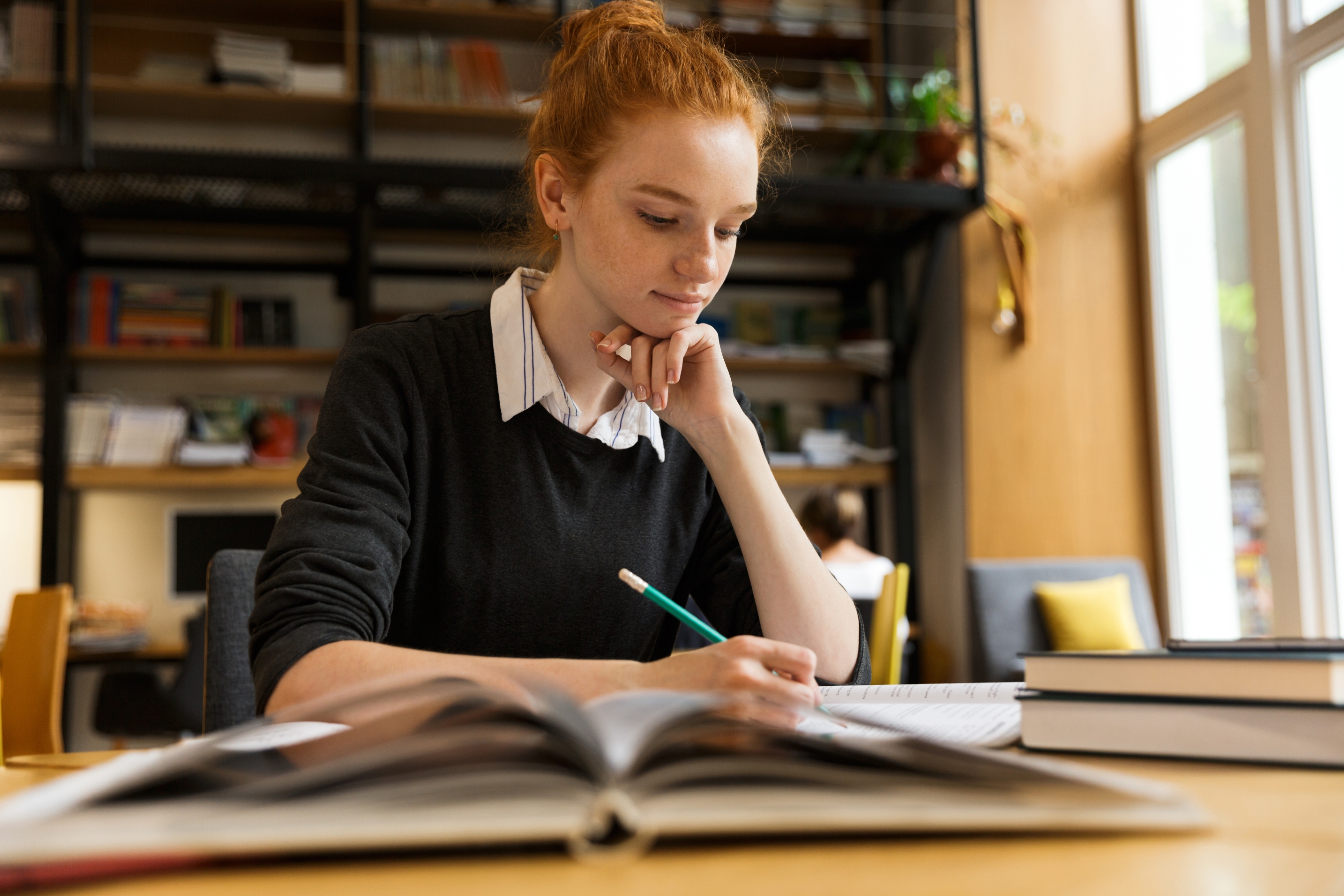 Girl studying in a library